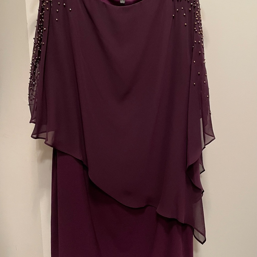 Beaded, capelet sheath dress.